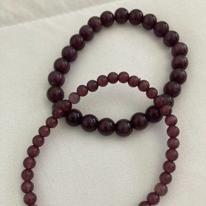 Pair of burgundy/brown beaded bracelets